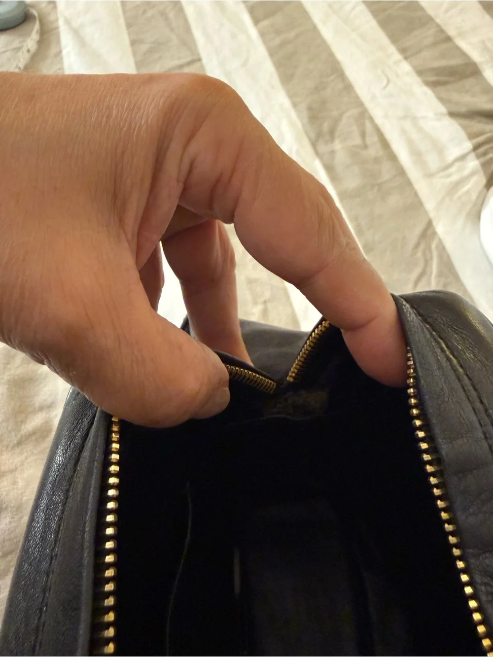 CHANEL Black Leather Zipper Pouch with Gold-Tone Hardware